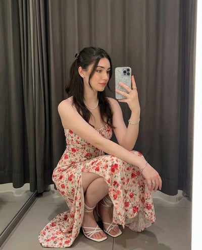 Elegant Indoor Squatting Mirror Selfie in a Floral Maxi Dress (4:5) thumbnail