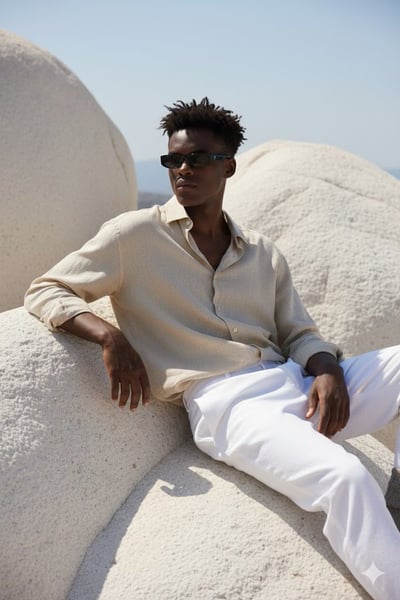 Hyper-Realistic Mediterranean Portrait on Smooth White Rocks thumbnail