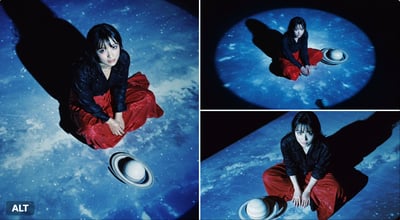 Overhead Lomo LC-A Film Actress on Black Floor with Blue Sky Projection thumbnail